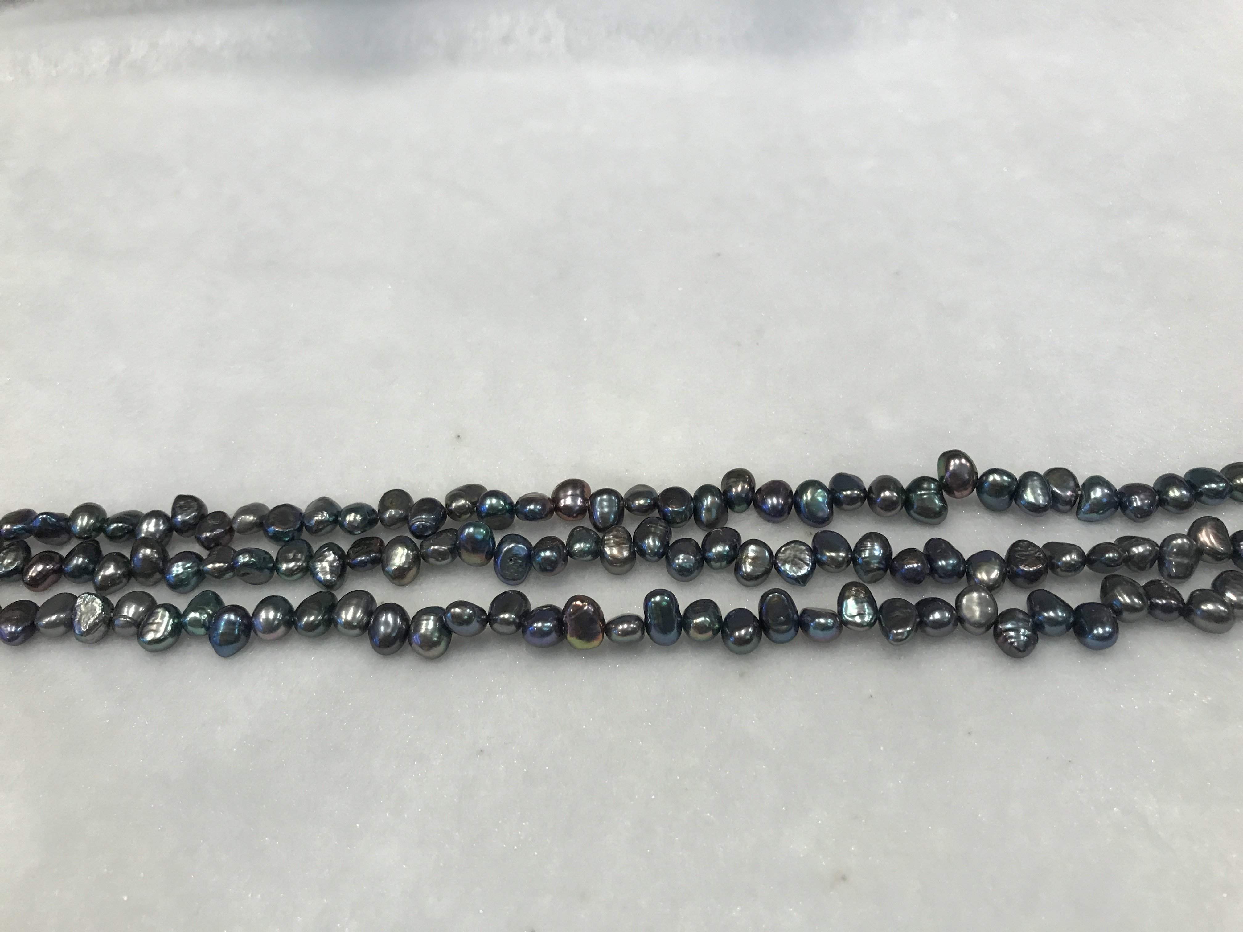 Strands Of Loose Pearls 7mm Peacock Irregular-Pearl Rack