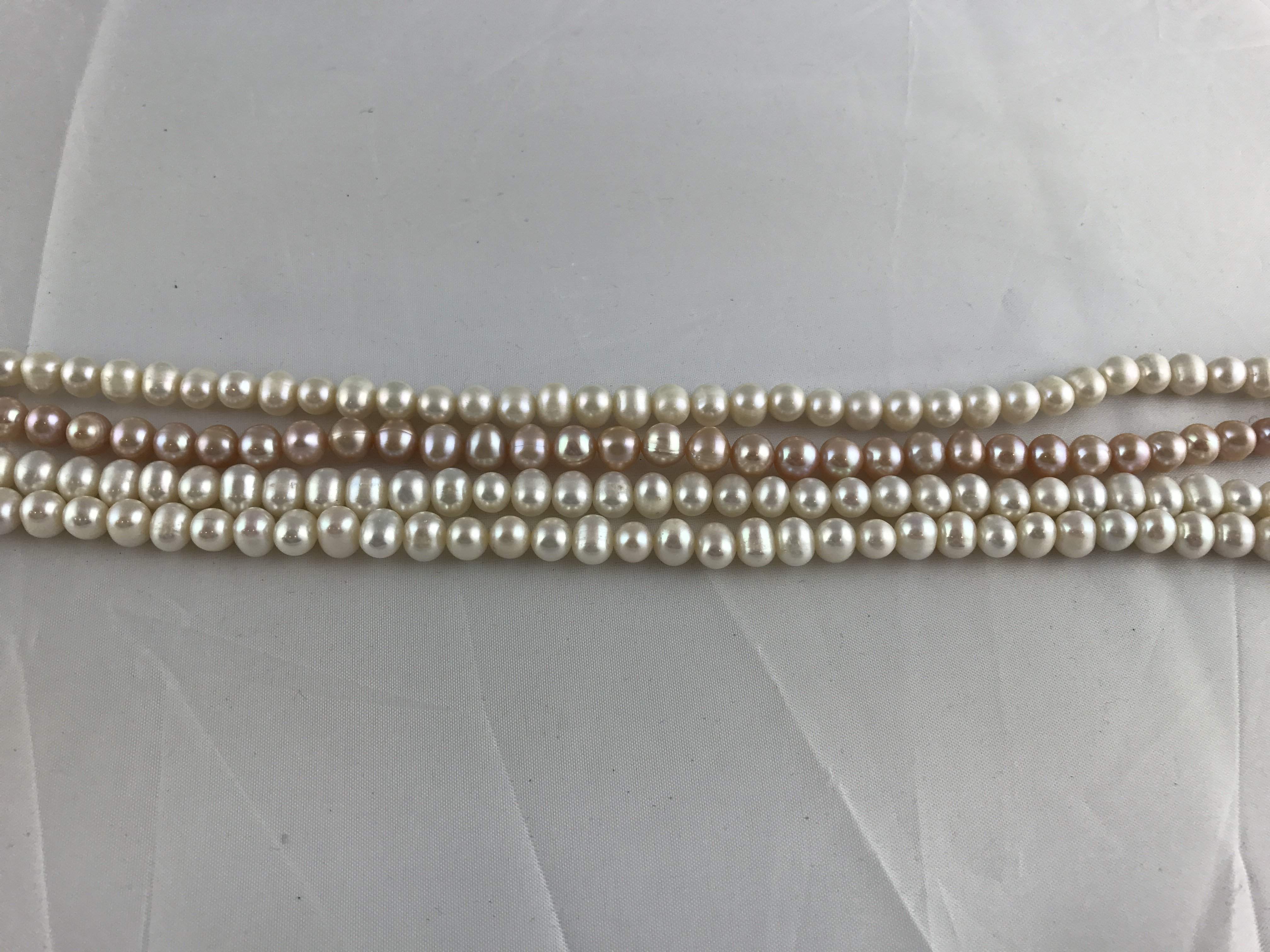 Strands Of Loose Pearls 8mm Off-Round White-Pearl Rack