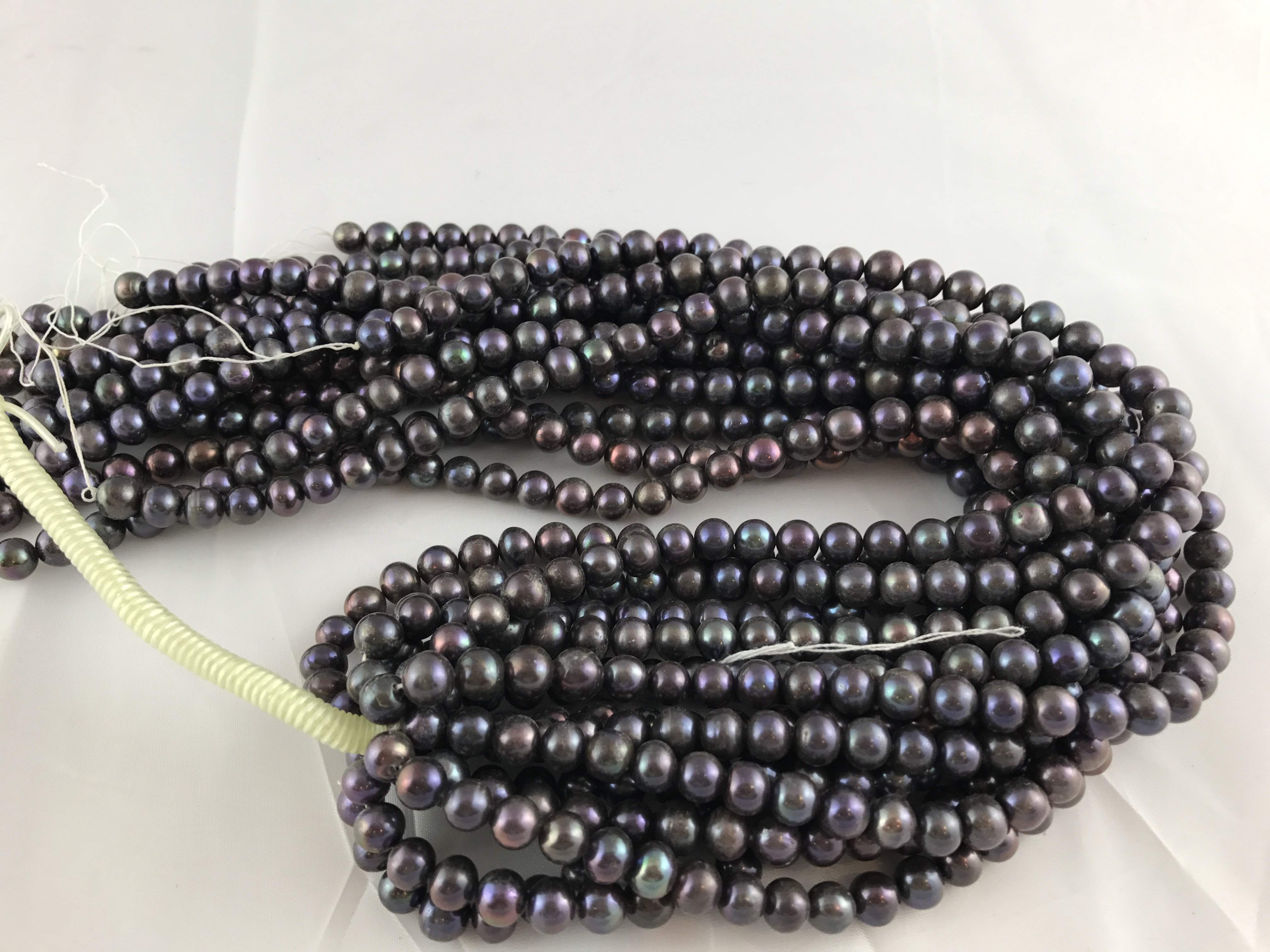 Strands Of Loose Pearls 8mm Off-Round Peacock Blue-Pearl Rack
