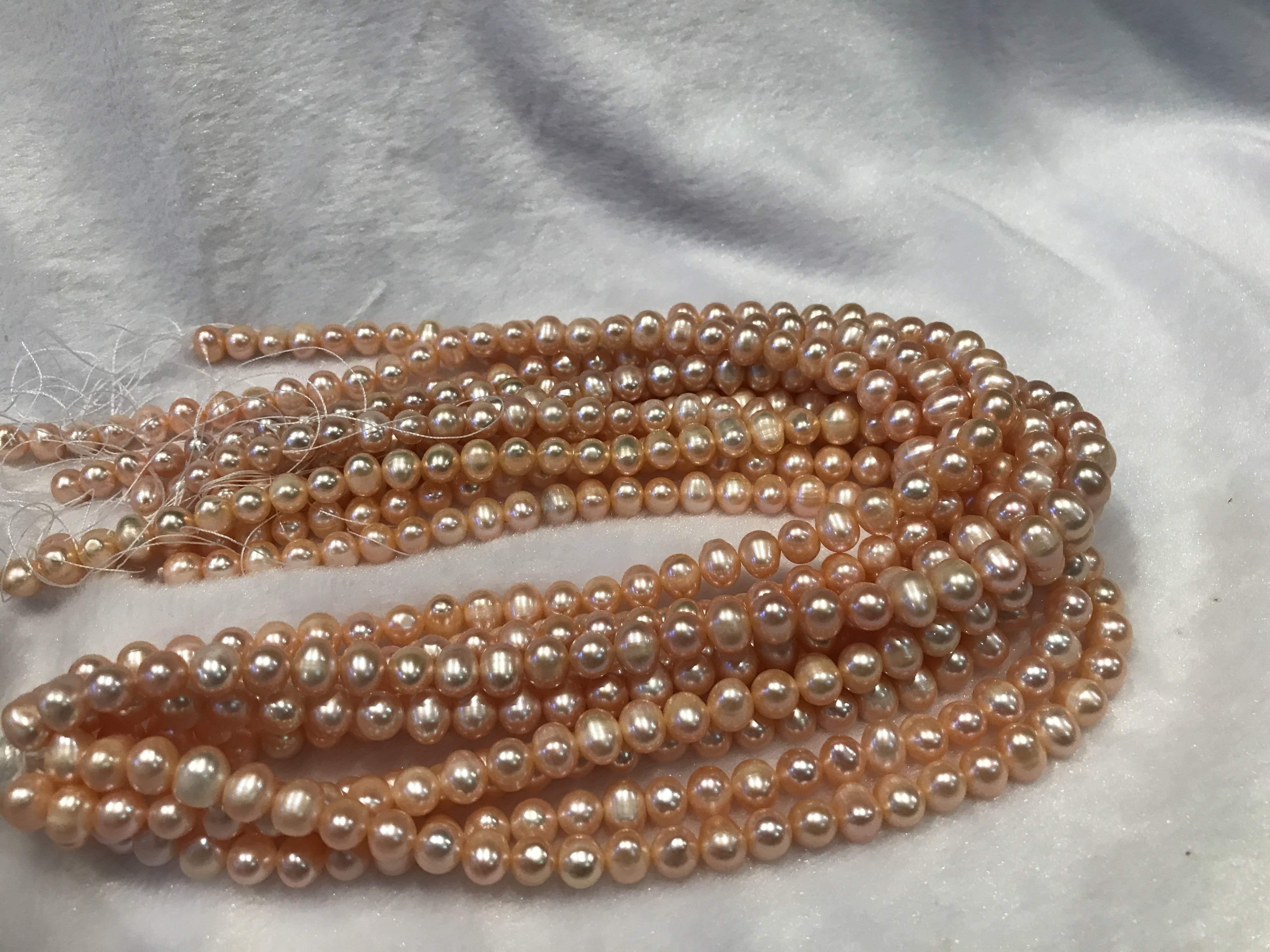 Strands Of Loose Pearls 8-9mm Off-Round Peach-Pearl Rack