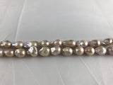 Strand Of Loose Baroque Pearls 15x25mm Peach-Pearl Rack