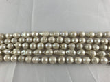 Strand Of Loose Baroque Pearls 15x25mm White-Pearl Rack