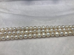 Strands Of Loose Pearls 11mm Off-Round White-Pearl Rack
