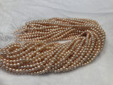 Strands Of Loose Pearls 5mm Off-Round Peach-Pearl Rack