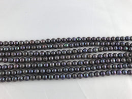 Strands Of Loose Pearls 8mm Off-Round Peacock Blue-Pearl Rack